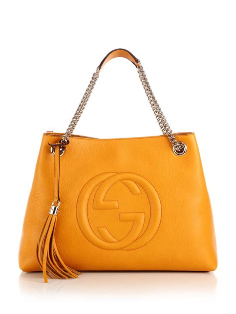 pastel yellow gucci bag|Gucci leather shoulder bag.